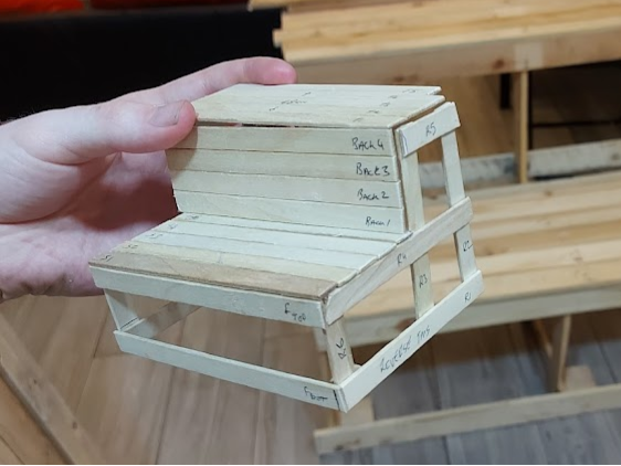 Numbered timber pieces laid out